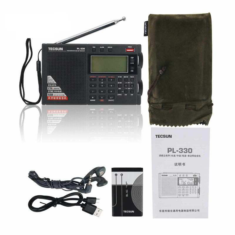 Tecsun PL-330 wereldontvanger met alle meegeleverde accessoires