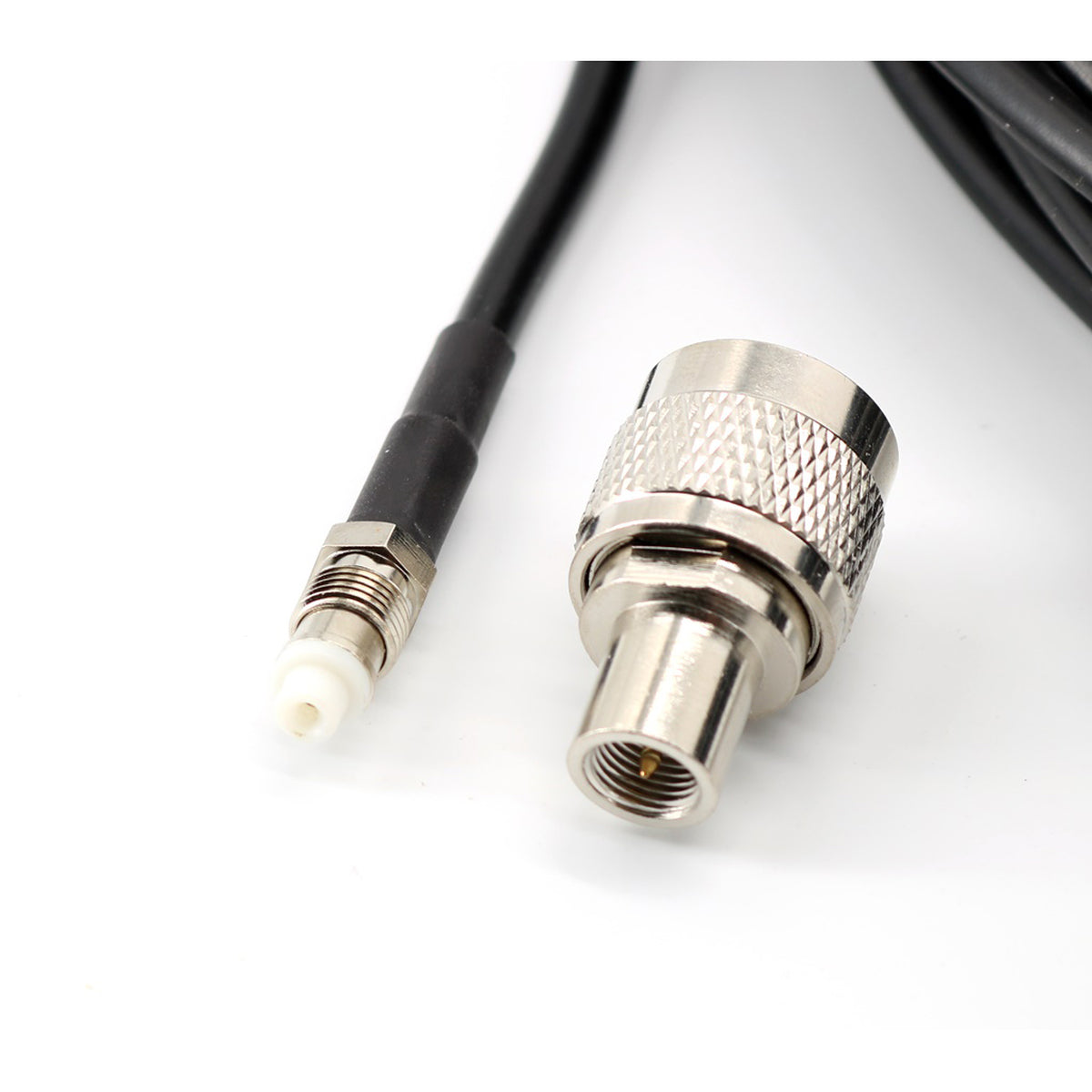 FME-connector aan een RG58 coax kabel en een losse PL-connector (UHF-Male)